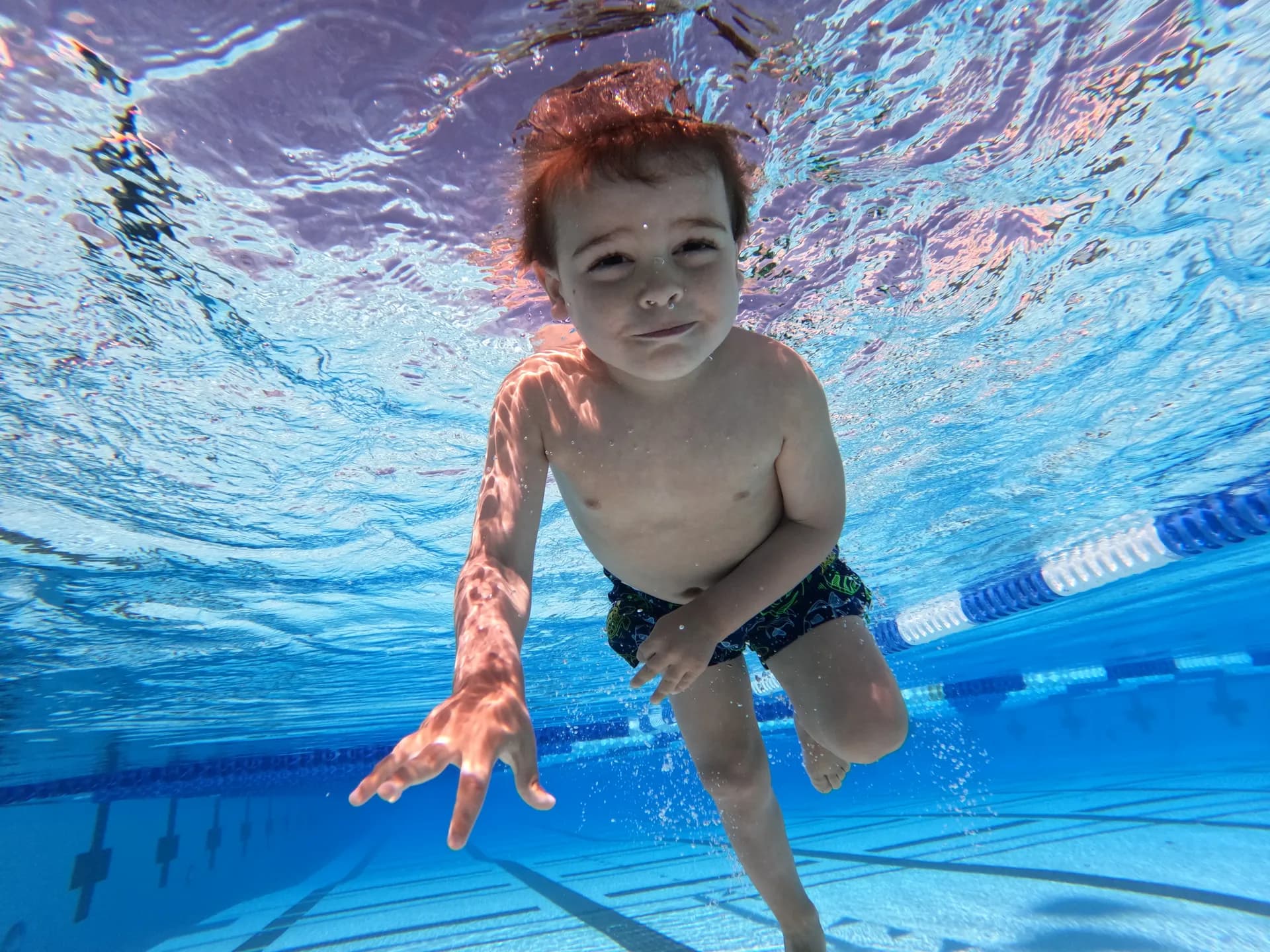 Child learning self-rescue technique