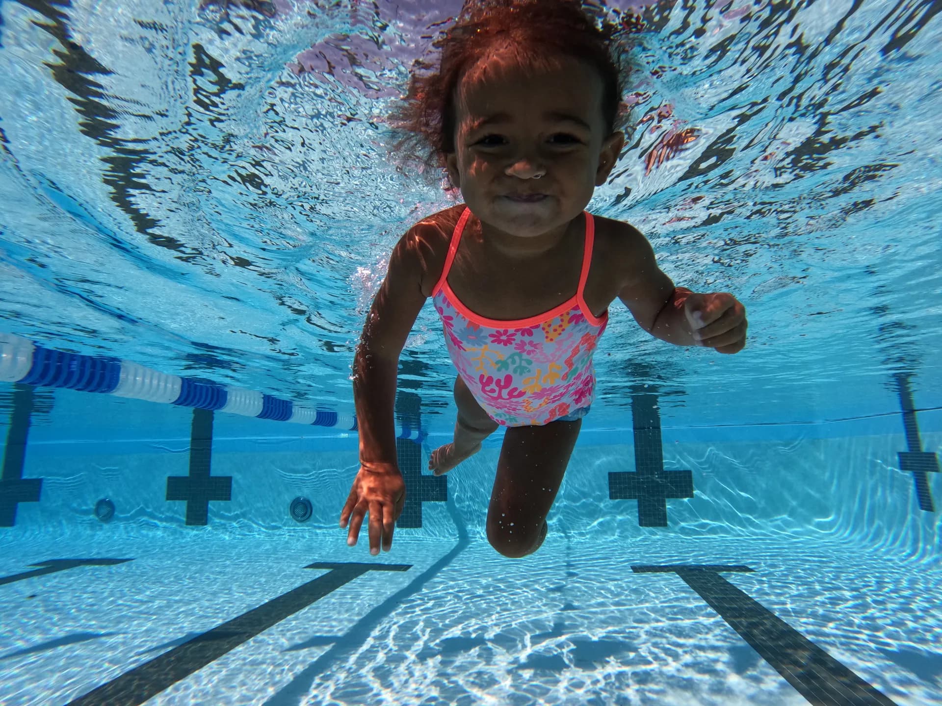 Instructor demonstrating ISR techniques with a child